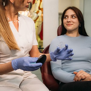 a patient during her Invisalign appointment