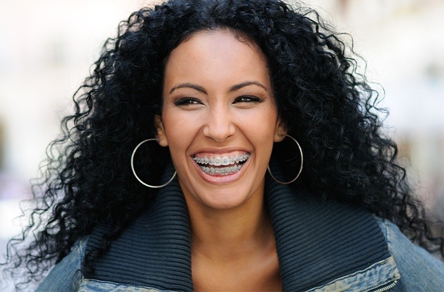 Laughing woman with traditional braces