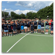 Group of children on tennis court