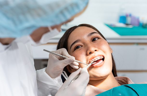 Female teenager visiting orthodontist