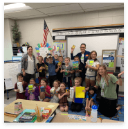 Orthodontic team members volunteering in classroom