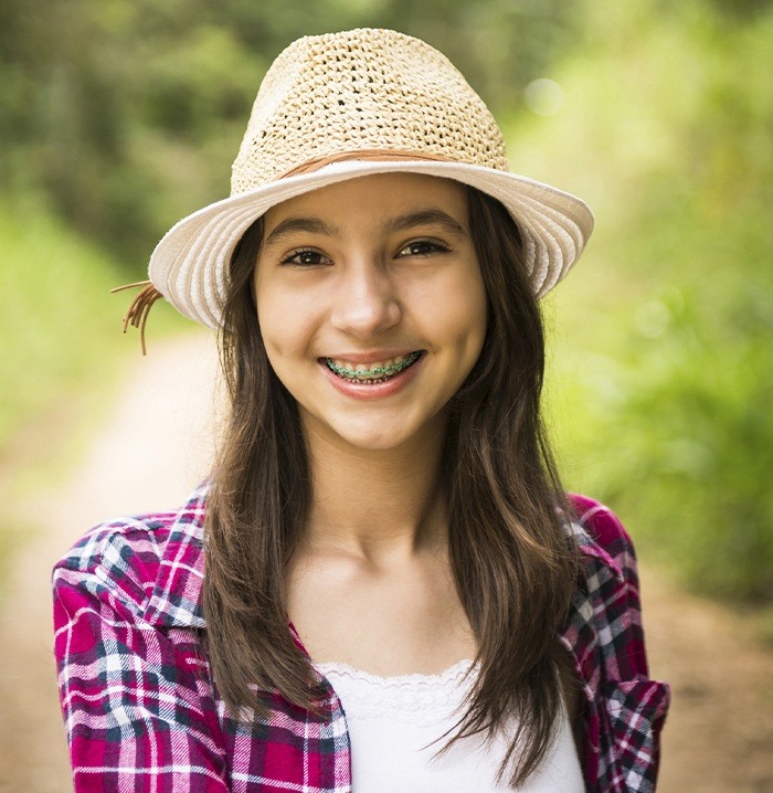 Teen girl with braces smiling