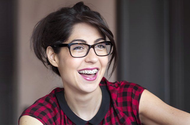 Woman receiving adult orthodontics treatment