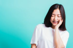 Young girl with swollen gums with braces in Lawrence