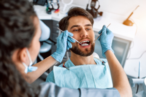 a patient with braces smiling brightly